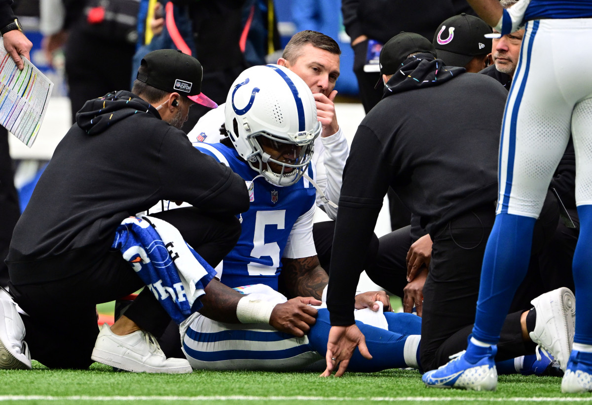 Oct 8, 2023; Indianapolis, Indiana, USA; Indianapolis Colts quarterback Anthony Richardson (5) sits on the field with a shoulder injury during the second quarter against the Tennessee Titans at Lucas Oil Stadium. Mandatory Credit: Marc Lebryk-USA TODAY Sports
